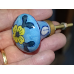 turquoise pear shaped button and yellow flower