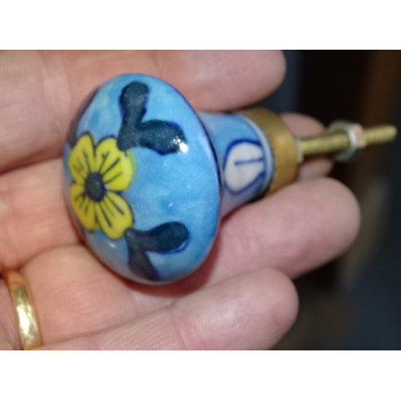 turquoise pear shaped button and yellow flower