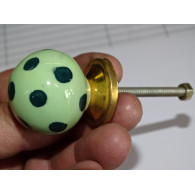 Light green ball button with dark green pitch