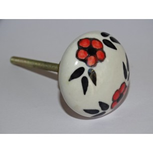 mobili manico rotondo con i fiori rossi e neri