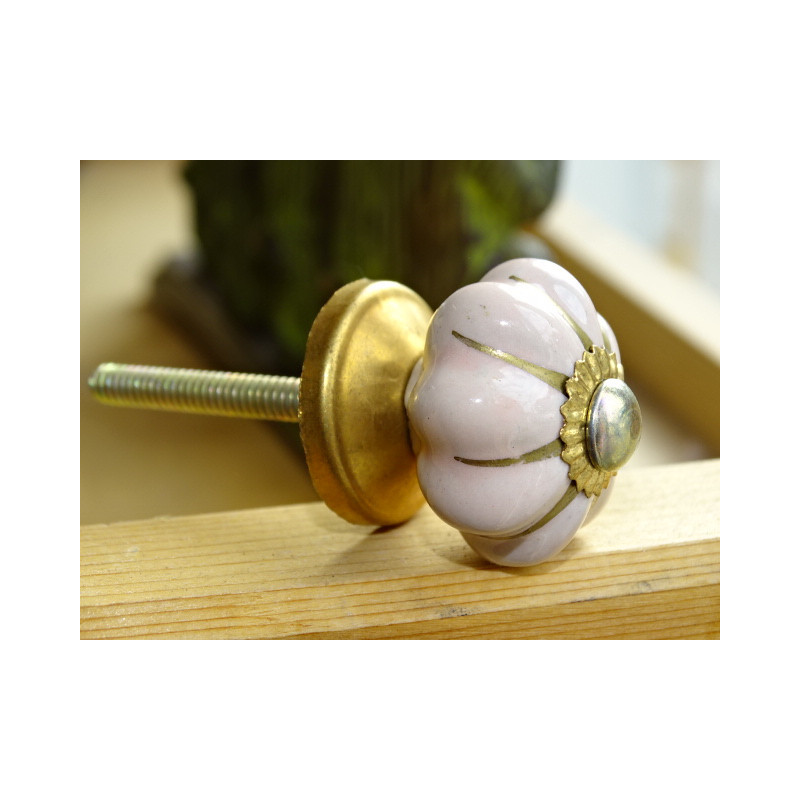 Small pumpkin handles in pinkish beige color