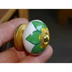 Porcelain drawer or door knobs with green and yellow flower