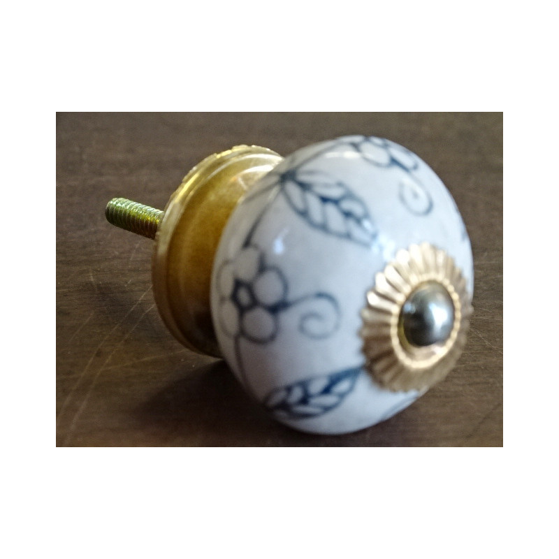 beige and black flowers handle